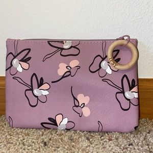 Brand: IPSY. Color: Purple and pink.